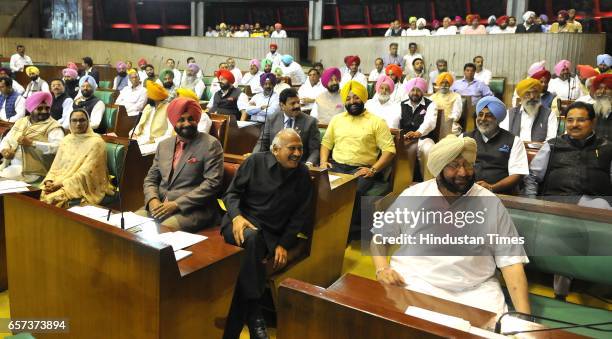 Punjab Chief Minister Capt. Amrinder Singh along with cabinet ministers on the first day of Punjab Vidhan Sabha session on March 24, 2017 in...