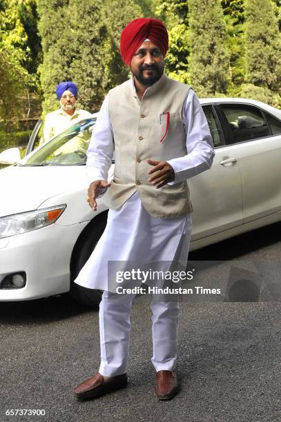 Punjab Cabinet Minister Charanjit Singh Channi coming without red beacon car on the first day of Punjab Vidhan Sabha session on March 24, 2017 in...