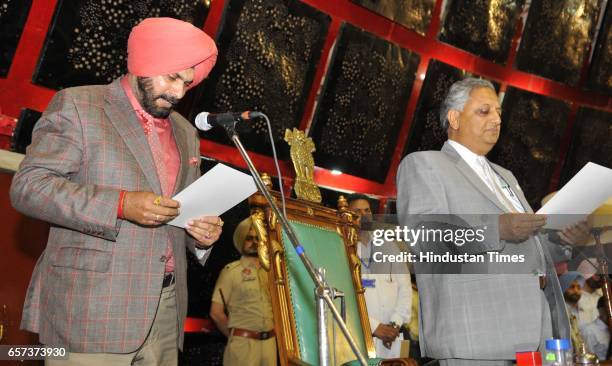 Punjab Cabinet Minister Navjot Singh Sidhu taking oath on the first day of Punjab Vidhan Sabha session on March 24, 2017 in Chandigarh, India.