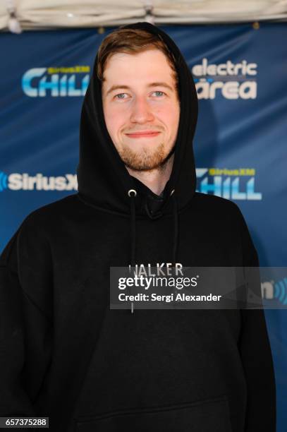 Alan Walker is interviewed at the event honoring Steve Aoki with a plaque for his single "Just Hold On" at 1 Hotel & Homes South Beach on March 23,...