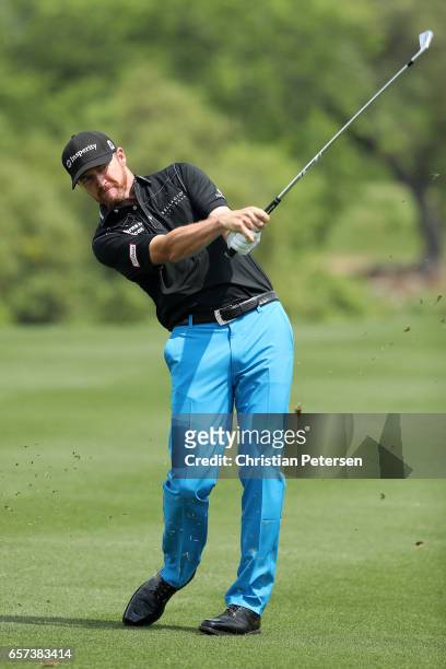 Jimmy Walker plays a shot on the 2nd hole of his match during round three of the World Golf Championships-Dell Technologies Match Play at the Austin...