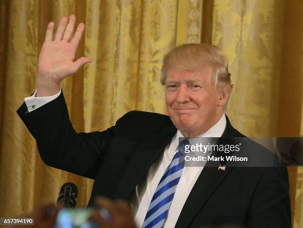 President Donald Trump speaks to guests during a Greek Independence Day celebration in the East Room of the White House, on March 24, 2017 in...