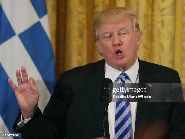 President Donald Trump speaks to guests during a Greek Independence Day celebration in the East Room of the White House, on March 24, 2017 in...