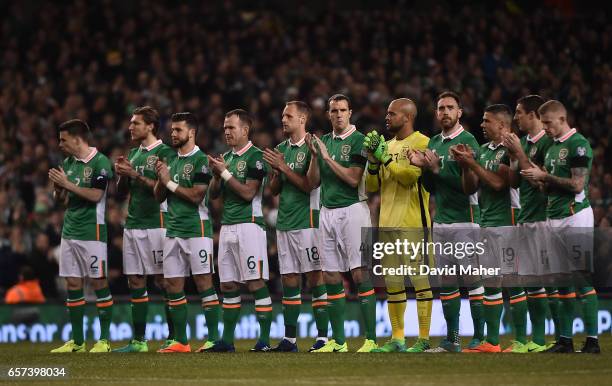 Dublin , Ireland - 24 March 2017; Republic of Ireland players stand for a minute's applause in tribute of the late Ryan McBride of Derry ahead of the...