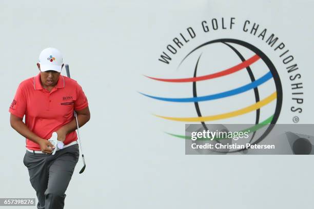 Byeong-Hun An of Korea plays a shot on the 16th hole of his match during round three of the World Golf Championships-Dell Technologies Match Play at...