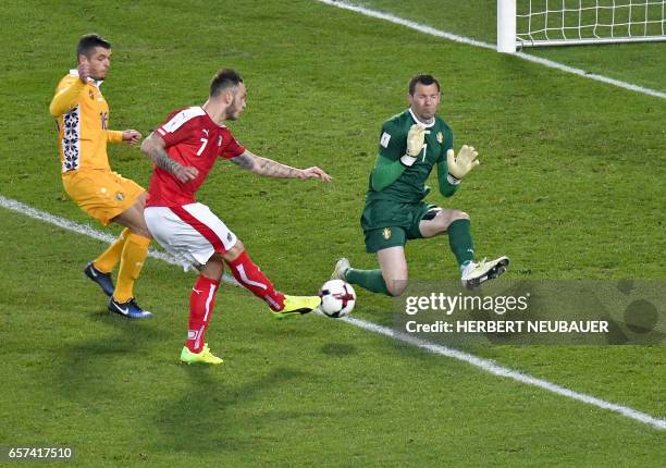 Austria's Marko Arnautovic has an attempt on against Moldavia's goalkeeper Stanislav Namasco's goal during the FIFA World Cup 2018 qualification...