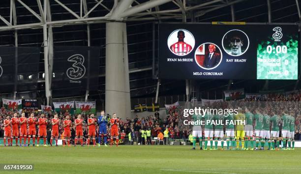 Players from both sides observe a minute of applause in memory of Derry City captain Ryan McBride, Former FAI president Michael 'Milo' Corcoran and...