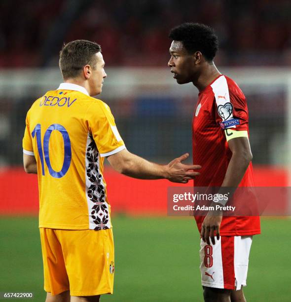 David Alaba of Austria has an argument with Alexandru Dedov of Moldova during the Austria v Moldavia 2018 FIFA World Cup Qualifier match at Ernst...