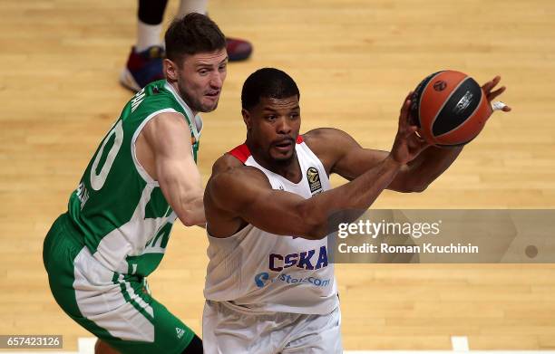 Kyle Hines, #42 of CSKA Moscow competes with Vadim Panin, #20 of Unics Kazan during the 2016/2017 Turkish Airlines EuroLeague Regular Season Round 28...