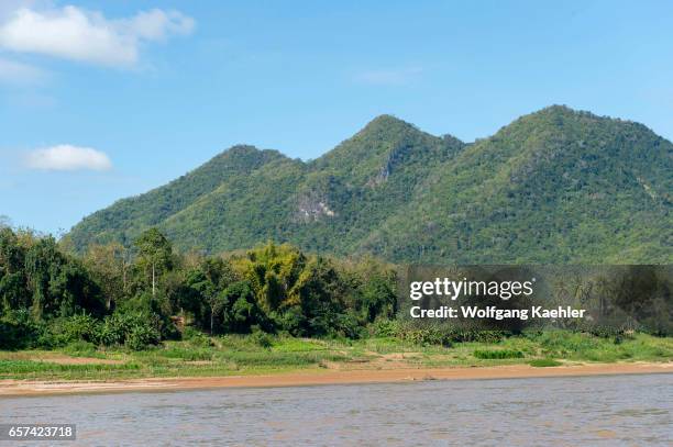 View of the Mekong River and landscape on the way to Pak Ou Cave near Luang Prabang in Central Laos.