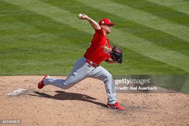 Trevor Rosenthal of the St Louis Cardinals throws the ball against the Washington Nationals in the seventh inning during a spring training game at...