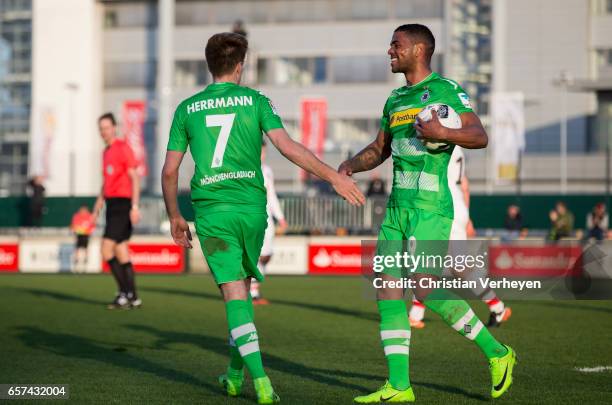 Patrick Herrmann of Borussia Moenchengladbach celebrate with Kwame Yeboah after he scores his teams fourth goal during the Friendly Match between...