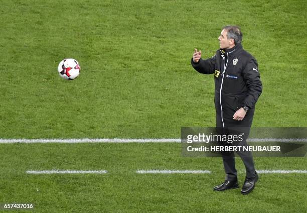 Austria's head coach Marcel Koller throws the ball during the FIFA World Cup 2018 qualification football match between Austria and Moldova at the...