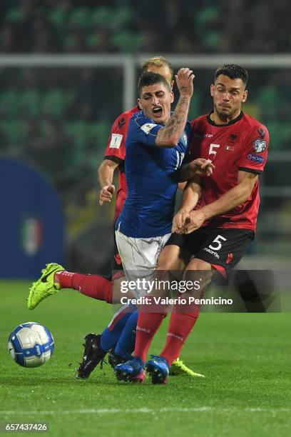 Marco Verratti of Italy clashes with Frederic Veseli of Albania during the FIFA 2018 World Cup Qualifier between Italy and Albania at Stadio Renzo...