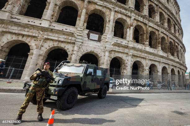 Rome, Italy. 24th March, 2017. Italian military corps stands in front of the Colosseum a day ahead of an European Union summit commemorating the 60th...
