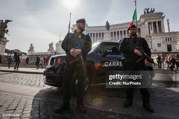 Rome, Italy. 24th March, 2017. Italian paramilitary police patrol stands in front of the Monument of the Unknown Soldier in Piazza Venezia Square a...