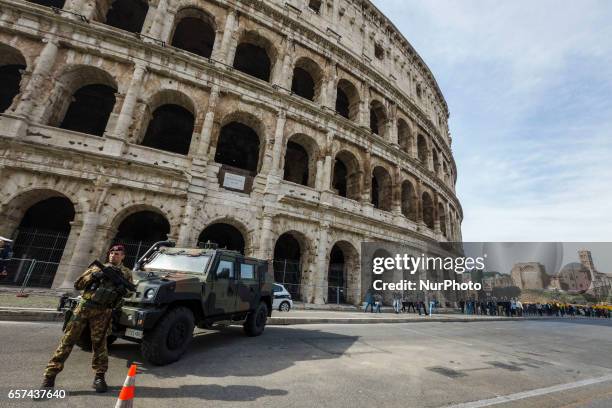 Rome, Italy. 24th March, 2017. Italian military corps stands in front of the Colosseum a day ahead of an European Union summit commemorating the 60th...