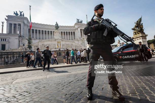 Rome, Italy. 24th March, 2017. Italian paramilitary police patrol stands in front of the Monument of the Unknown Soldier in Piazza Venezia Square a...