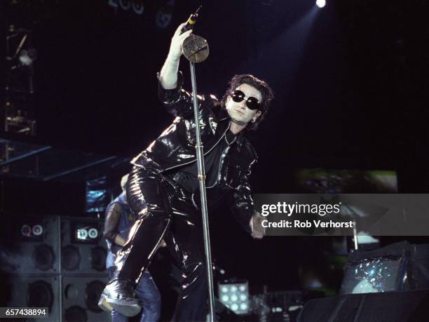 Bono of U2 performs on stage at Feyenoord Stadiium on the Zoo TV-Zooropa Tour, De Kuip, Rotterdam, Netherlands, 9th May 1993.