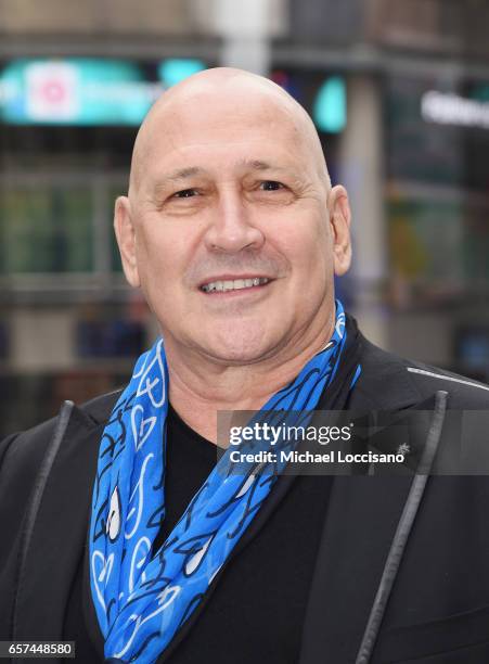 Fashion designer Carmen Marc Valvo and The Colon Cancer Alliance ring the Nasdaq Stock Market Opening Bell at NASDAQ on March 24, 2017 in New York...