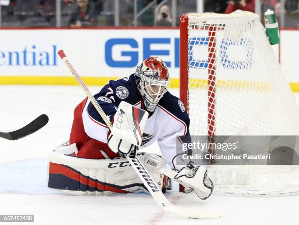 Sergei Bobrovsky of the Columbus Blue Jackets makes a save during the second period against the New Jersey Devils on March 19, 2017 at the Prudential...