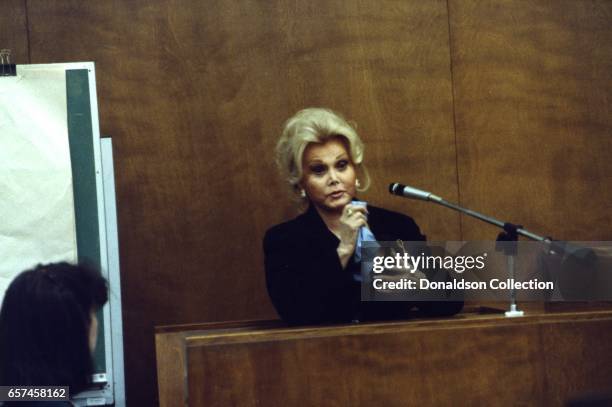 Zsa Zsa Gabor testifies in her defense after being accused of slapping a police officer in September 1989 in Los Angeles, California.