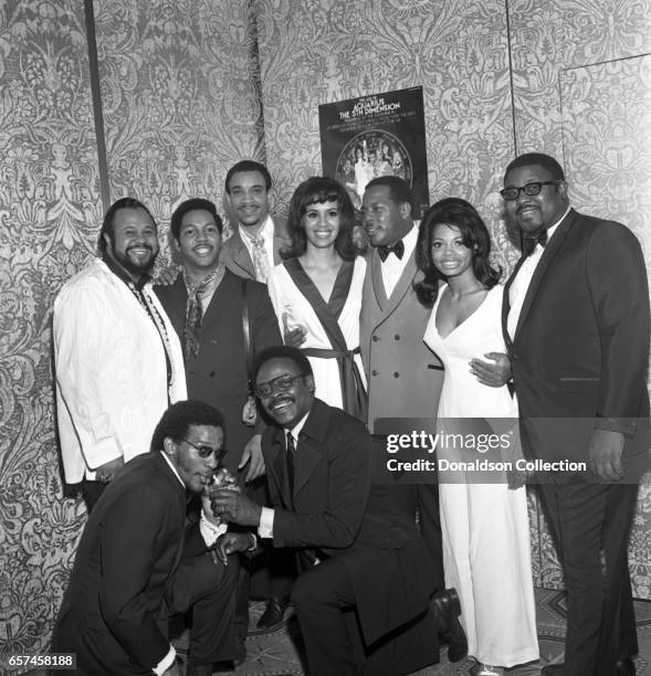 Marilyn McCoo, Florence LaRue, Billy Davis, Jr., LaMonte McLemore, and Ron Townson of the vocal group "5th Dimension" at a Liberty UA Records party...