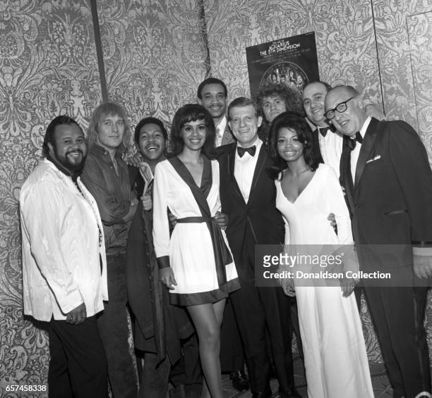 Marilyn McCoo, Florence LaRue, Billy Davis, Jr., LaMonte McLemore, and Ron Townson of the vocal group "5th Dimension" at a Liberty UA Records party...