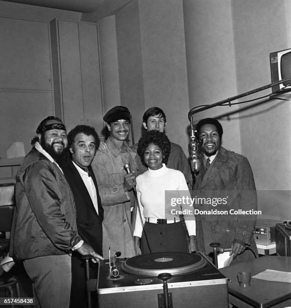 Marilyn McCoo, Florence LaRue, Billy Davis, Jr., LaMonte McLemore, and Ron Townson of the vocal group "5th Dimension" visit radio station WNEW on...