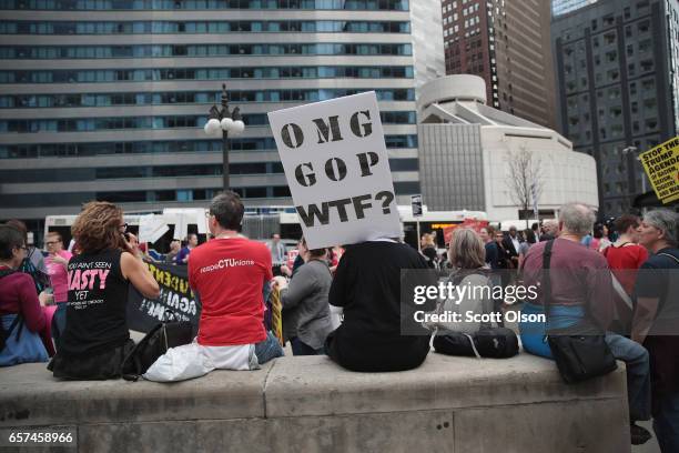 Demonstrators gather near Trump Tower to celebrate the defeat of President Donald Trump's revision of the Affordable Care Act on March 24, 2017 in...