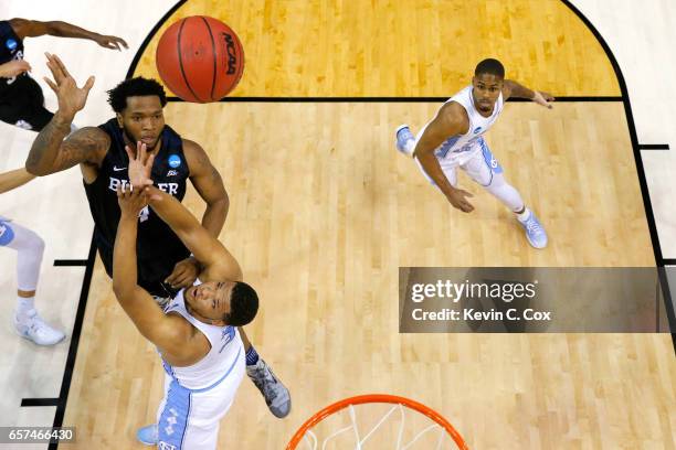 Tyler Wideman of the Butler Bulldogs shoots against Kennedy Meeks of the North Carolina Tar Heels in the first half during the 2017 NCAA Men's...