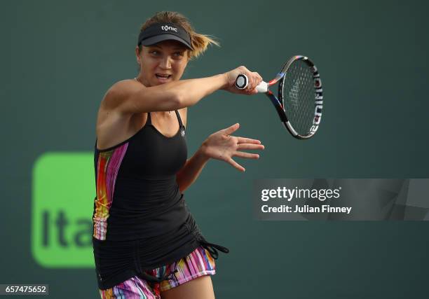 Patricia Maria Tig of Romania in action against Kristina Mladenovic of France at Crandon Park Tennis Center on March 24, 2017 in Key Biscayne,...