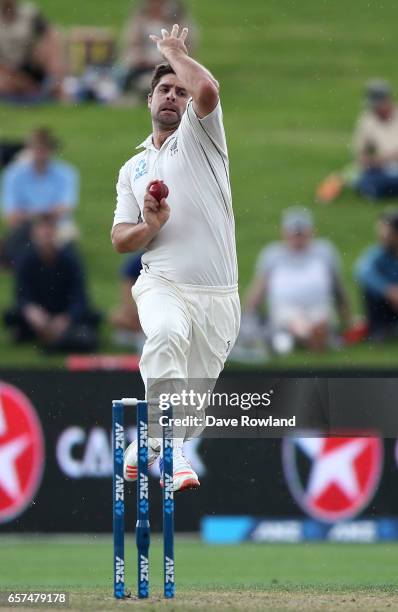 Colin de Grandhomme of New Zealand bowls during day one of the Test match between New Zealand and South Africa at Seddon Park on March 25, 2017 in...