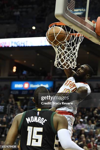 Tim Hardaway Jr. #10 of the Atlanta Hawks dunks against the Milwaukee Bucks during the first half of a game at the BMO Harris Bradley Center on March...