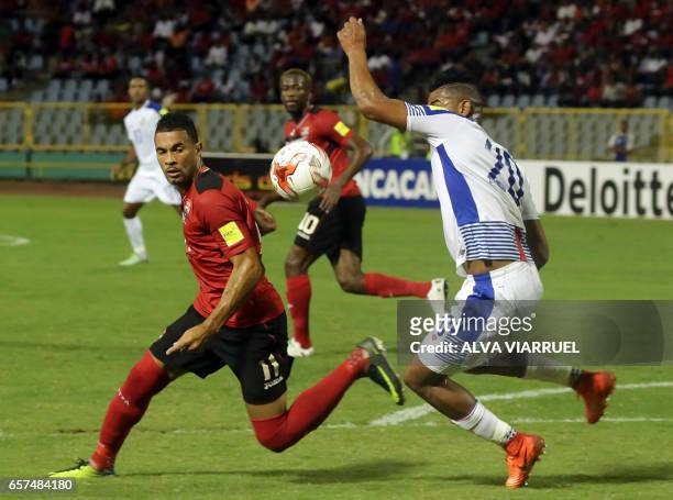 Trinidad and Tobago's defender Carlos Edwards vies for the ball with Panama's midfielder Anibal Godoy during their 2018 FIFA World Cup qualifier...