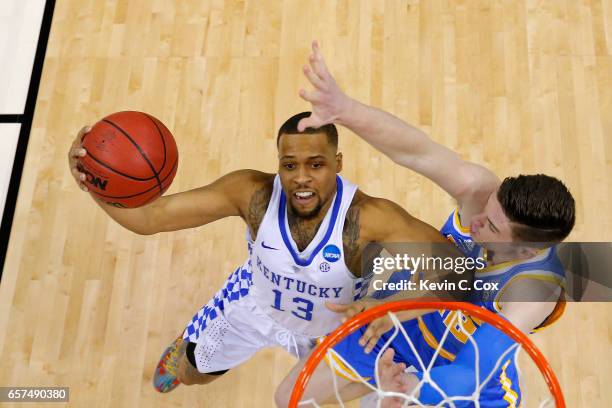 Isaiah Briscoe of the Kentucky Wildcats drives to the basket against TJ Leaf of the UCLA Bruins in the first half during the 2017 NCAA Men's...