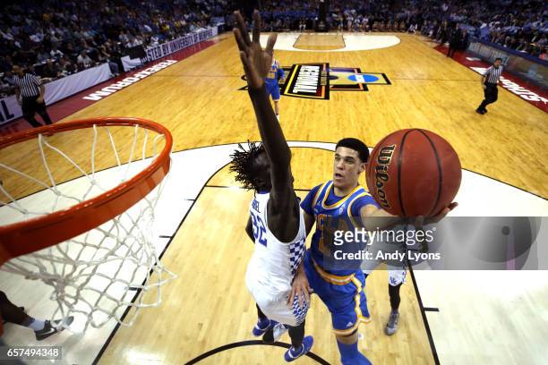 Lonzo Ball of the UCLA Bruins drives to the basket against Wenyen Gabriel of the Kentucky Wildcats in the first half during the 2017 NCAA Men's...