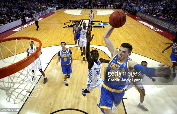 Leaf of the UCLA Bruins goes up for a dunk against Wenyen Gabriel of the Kentucky Wildcats in the first half during the 2017 NCAA Men's Basketball...