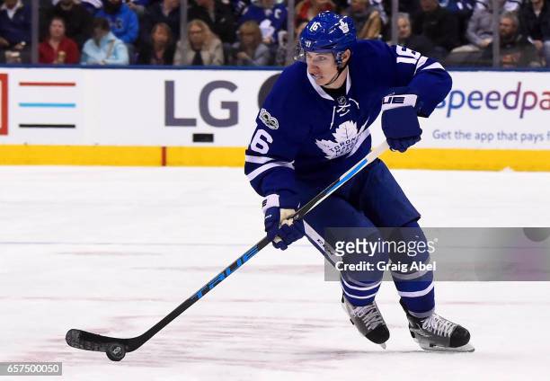 Mitch Marner of the Toronto Maple Leafs carries the puck against the New Jersey Devils during the second period at the Air Canada Centre on March 23,...