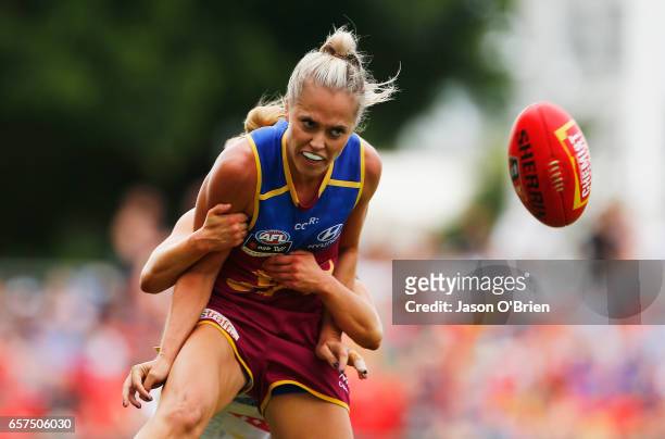 Kaitlyn Ashmore of the Lions is tackled during the AFL Women's Grand Final between the Brisbane Lions and the Adelaide Crows on March 25, 2017 in...