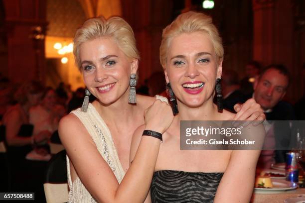 Julia Meise and her twin sister Nina Meise wearing jewelry by Thomas Jirgens, Juwelenschmiede, during the 8th Filmball Vienna at City Hall on March...