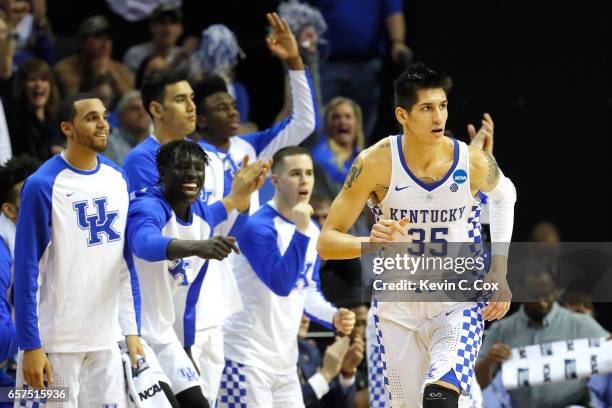 The Kentucky Wildcats bench celebrates after a shot by Derek Willis in the second half against the UCLA Bruins during the 2017 NCAA Men's Basketball...