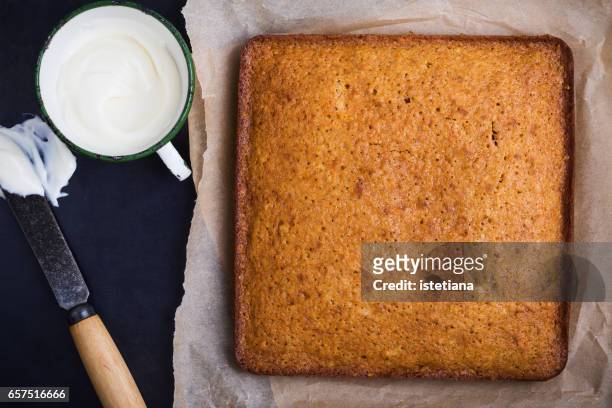 homemade pumpkin sheet cake ready to decorate - square cake stock pictures, royalty-free photos & images