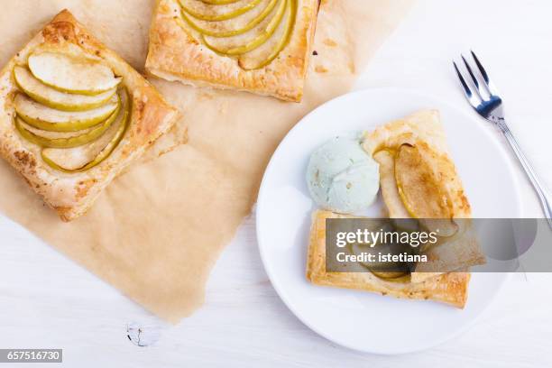 homemade puffed pastry apple tart with ice cream - puff pastry stock pictures, royalty-free photos & images