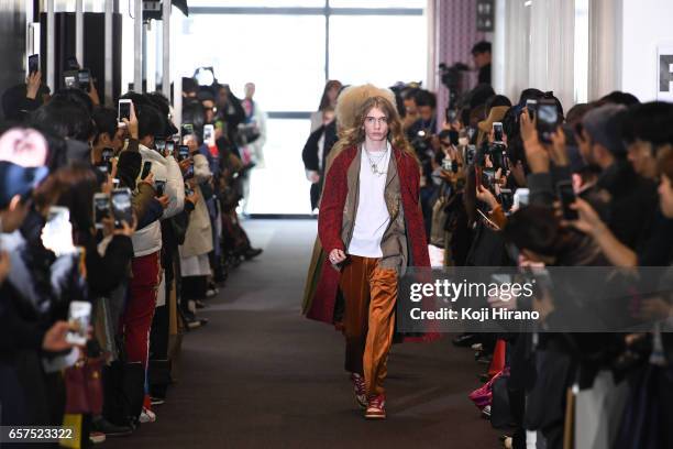 Model showcases designs on the runway during the TAAKK show as a part of Amazon Fashion Week Tokyo A/W 2017 at Shibuya Hikarie on March 25, 2017 in...