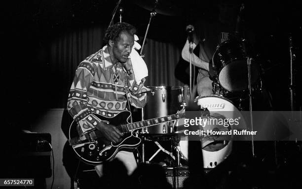 American Rock musician Chuck Berry plays guitar as he performs onstage, Cleveland, Ohio, March 21, 1986. The concert was held on the 34th anniversary...