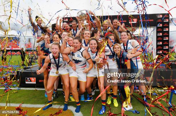 Crows players celebrate during the AFL Women's Grand Final between the Brisbane Lions and the Adelaide Crows on March 25, 2017 in Gold Coast,...