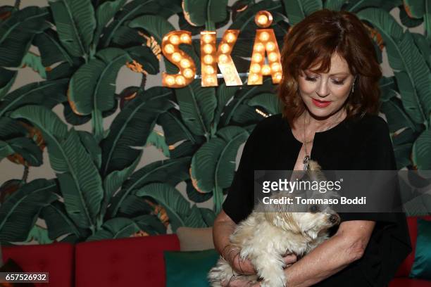 Actress Susan Sarandon and her dog Penny attend the Herring & Herring Sequence Magazine Launch Party, Co-hosted by Susan Sarandon at the private...