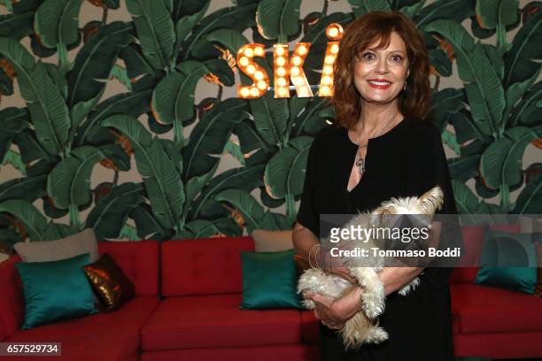 Actress Susan Sarandon and her dog Penny attend the Herring & Herring Sequence Magazine Launch Party, Co-hosted by Susan Sarandon at the private...