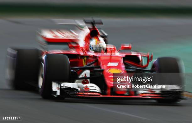 Sebastian Vettel of Germany driving the Scuderia Ferrari SF70H on track during qualifying for the Australian Formula One Grand Prix at Albert Park on...
